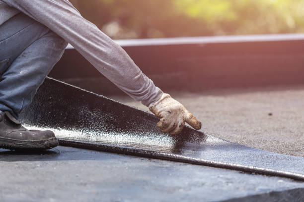 Professional Waterproofing technician working in Potomac, MD